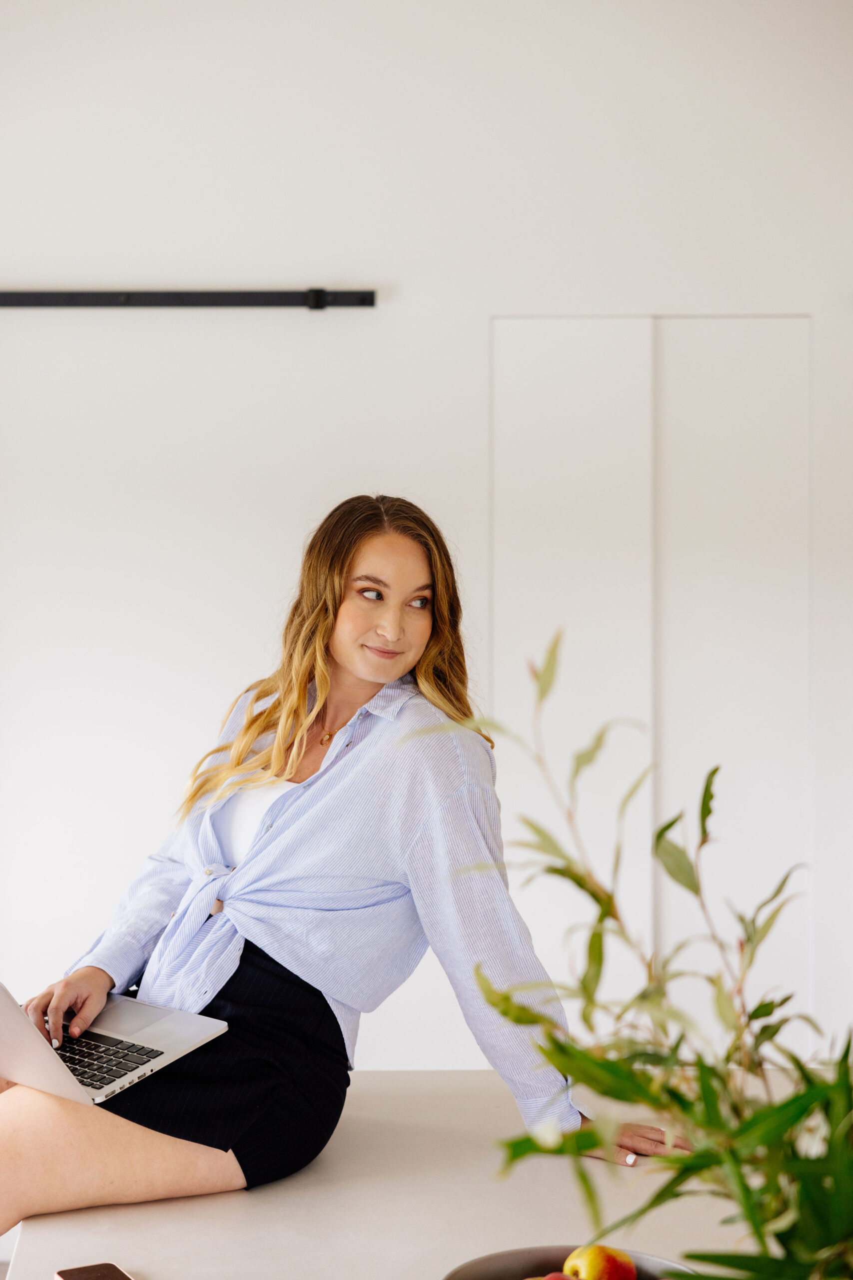 Social media manager working on a laptop